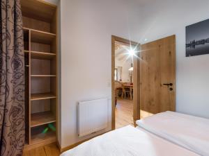 A bed or beds in a room at Ferienhaus Auerbauer