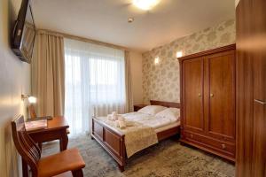 Postel nebo postele na pokoji v ubytování Villa Solaris