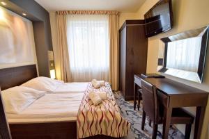 Postel nebo postele na pokoji v ubytování Villa Solaris