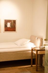 Letto o letti in una camera di Hotel Vanilla