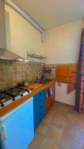A kitchen or kitchenette at ARTISTICO - Artistic flat in front of GUGGENHEIM COLLECTION