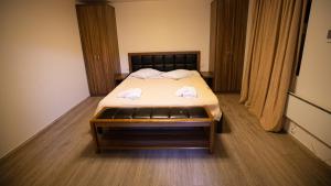 Voodi või voodid majutusasutuse Cross Resort Hotel toas