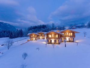 Chalets Weitblick Mariasteinerhof að vetri til