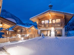 Chalets Weitblick Mariasteinerhof að vetri til