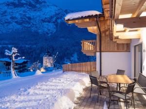 Chalets Weitblick Mariasteinerhof að vetri til