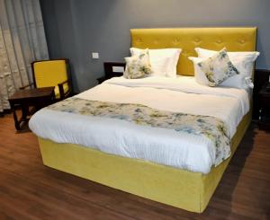 Postel nebo postele na pokoji v ubytování Olive By Tej Hotel And Resorts