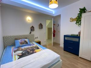 En eller flere senge i et værelse på Casa Noastra de La Mare