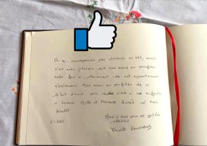 a book with a thumb up on the pages at Centre - L'Impérial - Parking in Saverne +33 photos