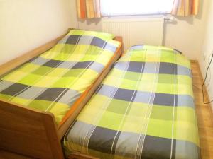 Posteľ alebo postele v izbe v ubytovaní Linz Apartment Comfort-Size