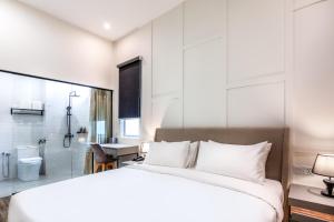 Postel nebo postele na pokoji v ubytování Wesley Hotel