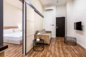 Postel nebo postele na pokoji v ubytování Wesley Hotel