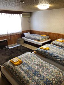 Cama o camas de una habitación en Hotel El Mayo