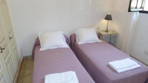 Ένα ή περισσότερα κρεβάτια σε δωμάτιο στο Résidence Marie Diane - Appart Coté Piscine F +24 φωτογραφίες