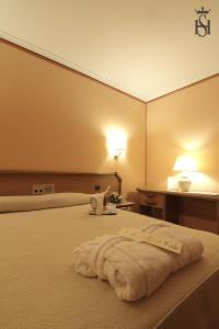Postel nebo postele na pokoji v ubytování Hospedium Hotel Europa Centro