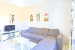 A television and/or entertainment centre at Villa Kiki