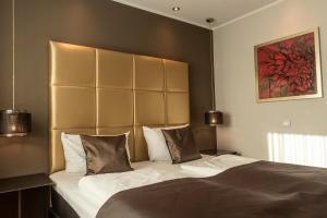 Postel nebo postele na pokoji v ubytování Mauritius Hotel & Therme