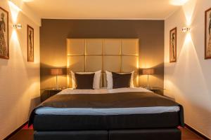 Postel nebo postele na pokoji v ubytování Mauritius Hotel & Therme