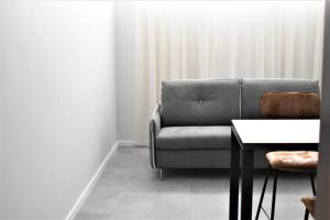 Posezení v ubytování Korpa Deli Rooms SPA