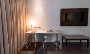 A television and/or entertainment center at La Laguna Gran Hotel 