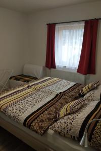 Ένα ή περισσότερα κρεβάτια σε δωμάτιο στο Apartmán u sjezdovky Filipovice