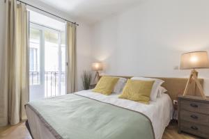 Cama o camas de una habitación en Apartamento Tirso III en Madrid