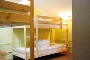 a room with two bunk beds in a room at Hostel Cinema Moscow Хостел Синема in Moscow