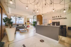 The lobby or reception area at Hotel Continental