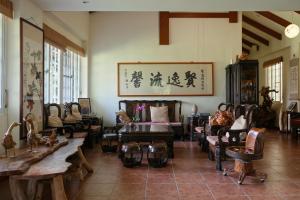 Zona d'estar a Wisdom Garden Home Stay