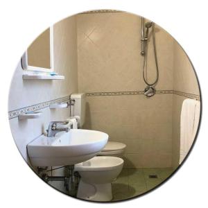 Kúpeľňa v ubytovaní Hotel Amedea