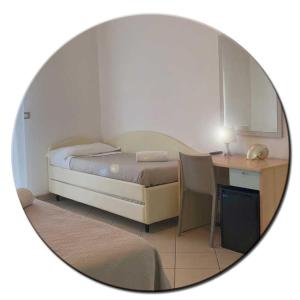 Posteľ alebo postele v izbe v ubytovaní Hotel Amedea