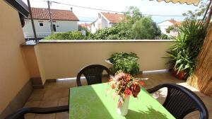Ein Balkon oder eine Terrasse in der Unterkunft Apartments Kirinčić