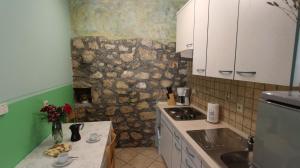 Küche/Küchenzeile in der Unterkunft Apartments Kirinčić