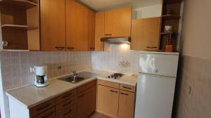 Küche/Küchenzeile in der Unterkunft Apartments Kirinčić