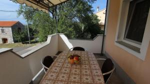 Ein Sitzbereich in der Unterkunft Apartments Kirinčić