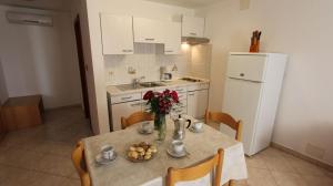 Küche/Küchenzeile in der Unterkunft Apartments Kirinčić
