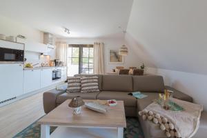 Kuchyň nebo kuchyňský kout v ubytování Haus am Strand Ferienwohnung Haus am Strand 3