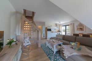 Kuchyň nebo kuchyňský kout v ubytování Haus am Strand Ferienwohnung Haus am Strand 3