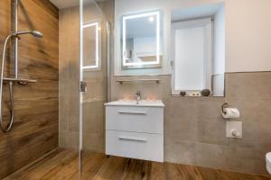 Koupelna v ubytování Ostseeklang + 36 fotografií