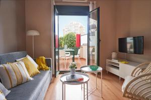 TV a/nebo společenská místnost v ubytování Lugaris Rambla Apartments
