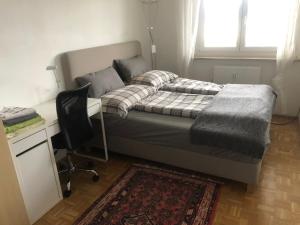 Łóżko lub łóżka w pokoju w obiekcie City Apartments Klinikum