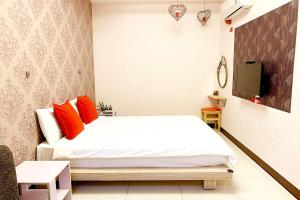Voodi või voodid majutusasutuse SNUG·NINE Hotel toas