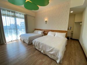 Letto o letti in una camera di 台東1314電梯民宿
