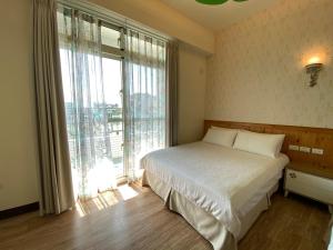Letto o letti in una camera di 台東1314電梯民宿