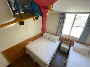 Letto o letti in una camera di 台東1314電梯民宿