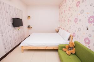 Voodi või voodid majutusasutuse SNUG·NINE Hotel toas