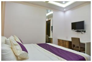 TV a/nebo společenská místnost v ubytování Hotel Siddharsh Heritage