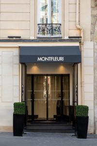 a store front of a building with a sign on it at Montfleuri in Paris