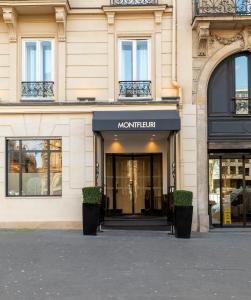 a building with a sign that reads montclair at Montfleuri in Paris