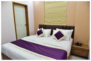 Postel nebo postele na pokoji v ubytování Hotel Siddharsh Heritage