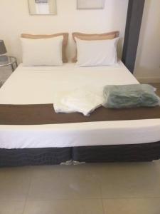 Gaia Hostel客房内的一张或多张床位